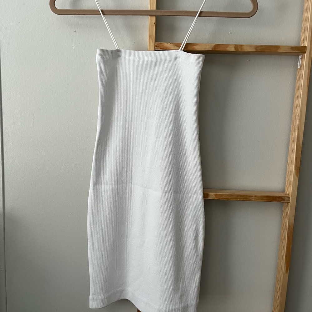 White spaghetti strap body-con dress.